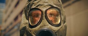 frame grab of man wearing gas mask